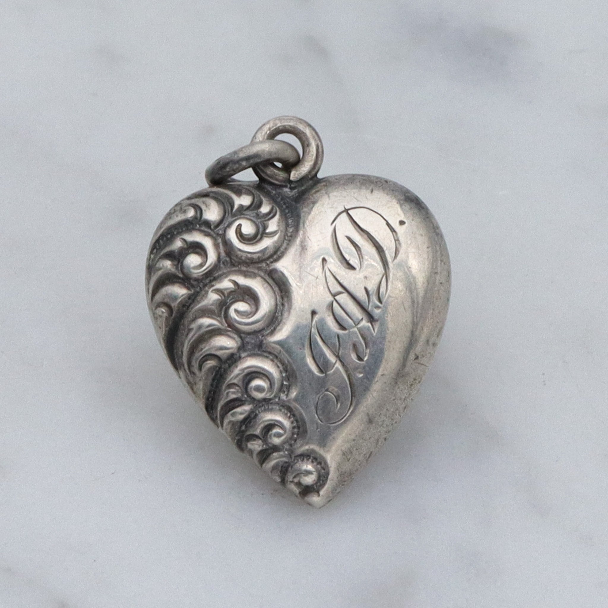 Antique Victorian repousse puffy heart charm pendant with monogram “J.A.D”
